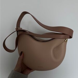Polène “Tonca” Leather Bag in Taupe